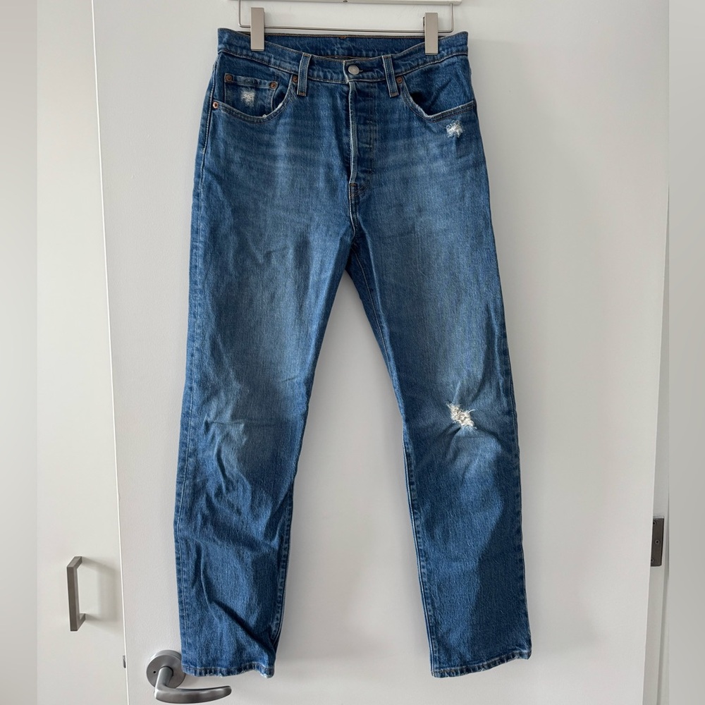 Levi’s 501s, slightly distressed